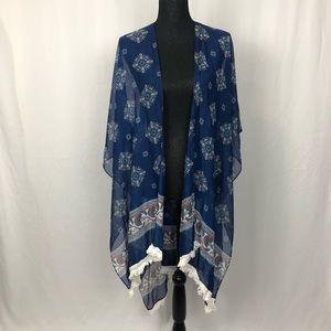 Sleeveless sheer shawl with fringe